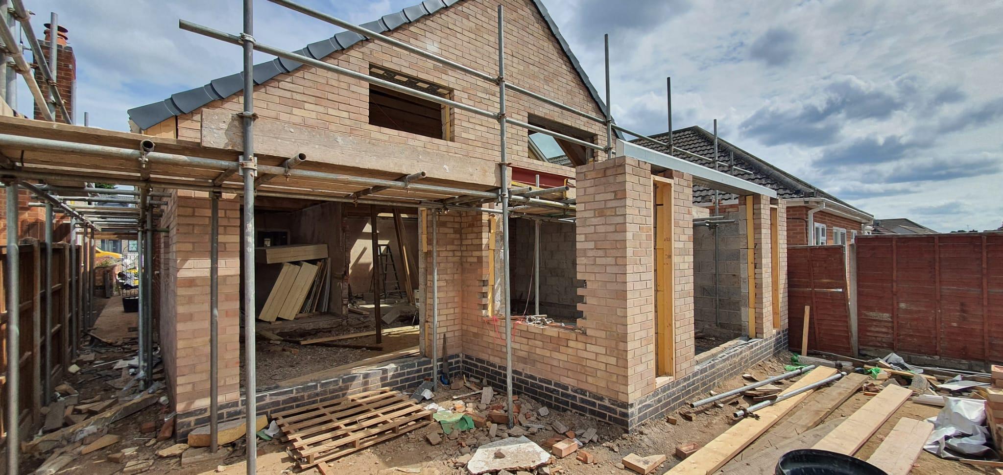 Work in progress — extension brickwork and scaffolding during construction, Rosedene Avenue, Leicester